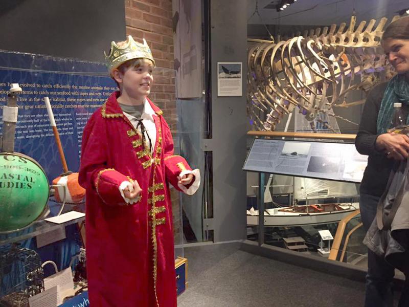 Friends Academy fifth grader William Gangi represents King George III in a class presentation on the American Revolution. BY ANGIE HILSMAN